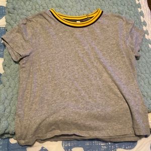 Gray tee with yellow and black neck